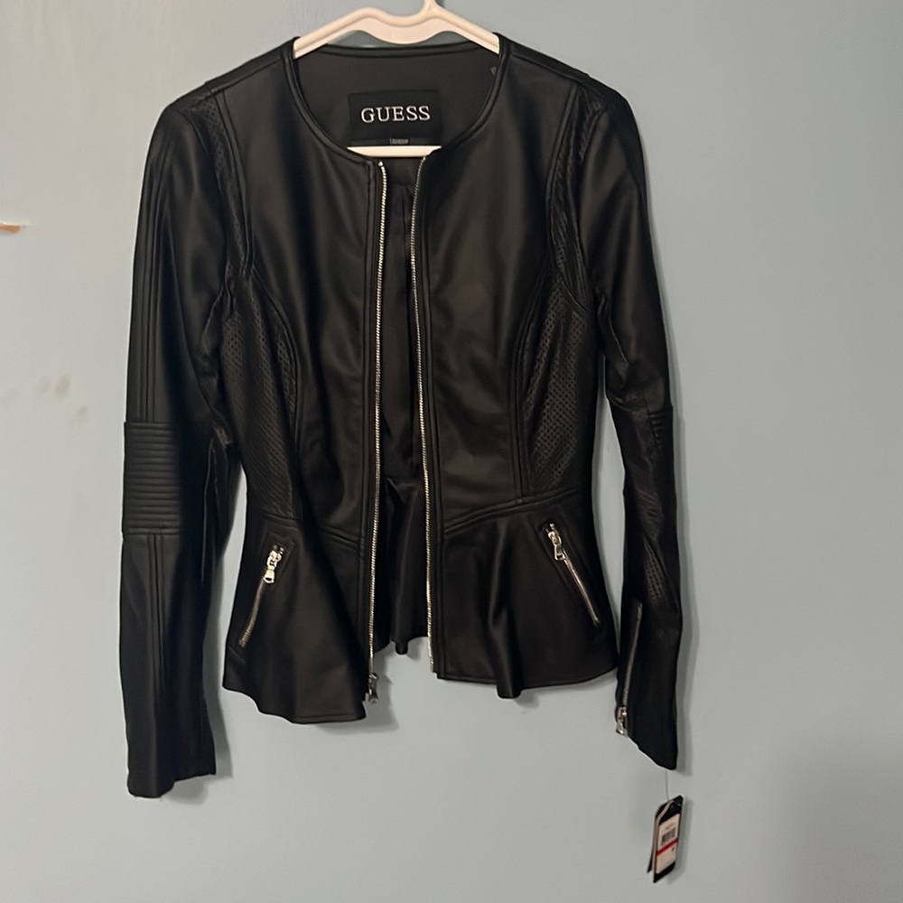 Brand new with tags!!!Guess is the brand.It is a size xs.It fits true to size.